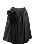 PRESSED ROSETTE BASQUE SKIRT